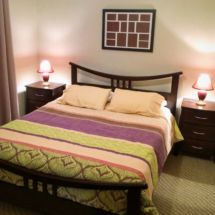 One of the cozy, relaxing bedrooms with queen-sized bed.